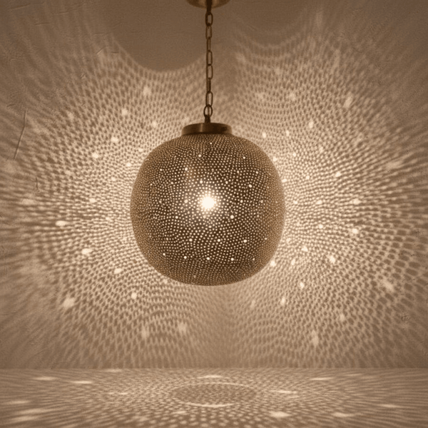 Gift Guide Brass and Copper Pieces for a New Home featuring Brass Globe Pendant Light