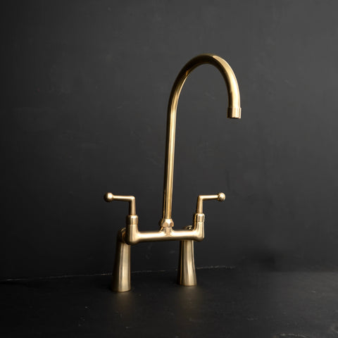 Unlacquered brass 3-hole bridge kitchen faucet – two handle, front view