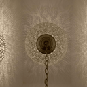 Intricate shadow brass pendant light close-up of cutwork lantern body – Brass For Homes