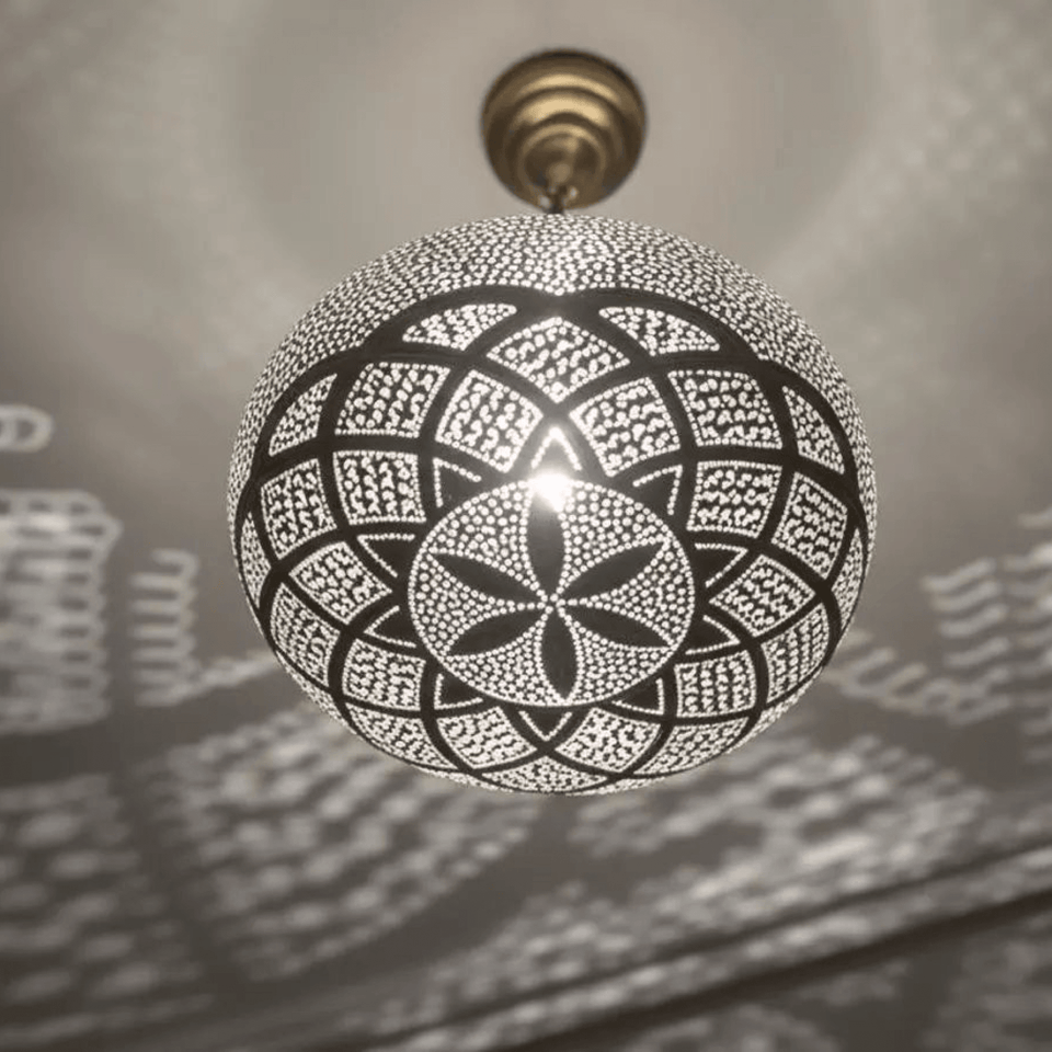 Brass mandala pendant light projecting floral shadow patterns on ceiling – Brass For Homes