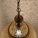 Tall boho brass teardrop pendant light glowing with warm amber light – Brass For Homes