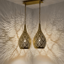 Pierced brass teardrop pendant light with lacy shadow effect on ceiling – Brass For Homes