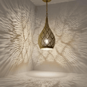 Handmade pierced brass teardrop ceiling lamp casting warm shadow patterns – Brass For Homes