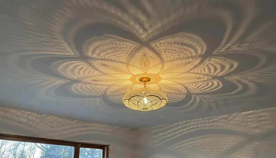 Handmade Moroccan brass pendant light casting floral shadow pattern – Brass For Homes