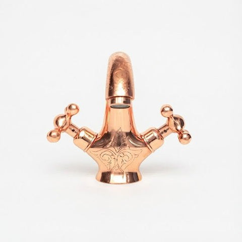 Hand-engraved copper bathroom faucet – ornate single hole, front view