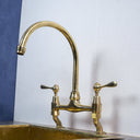 Unlacquered Brass Curved Legs Bridge Faucet - Brass For Homes - kitchen - faucets