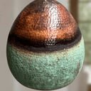 Green patina verdigris copper pendant with Moroccan-inspired oval cutouts — Brass For Homes